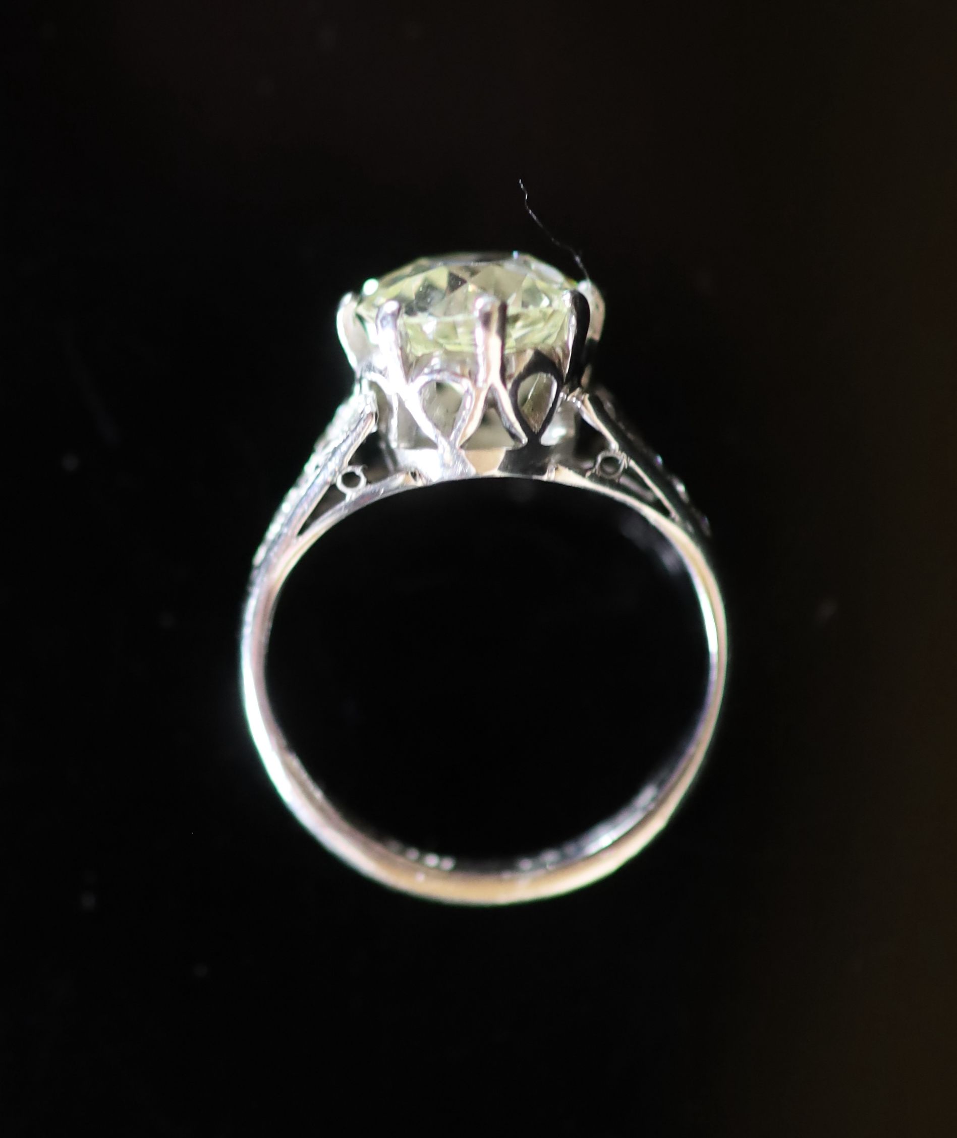 A 20th century 18ct white gold and platinum set single stone diamond ring, with diamond set shoulders